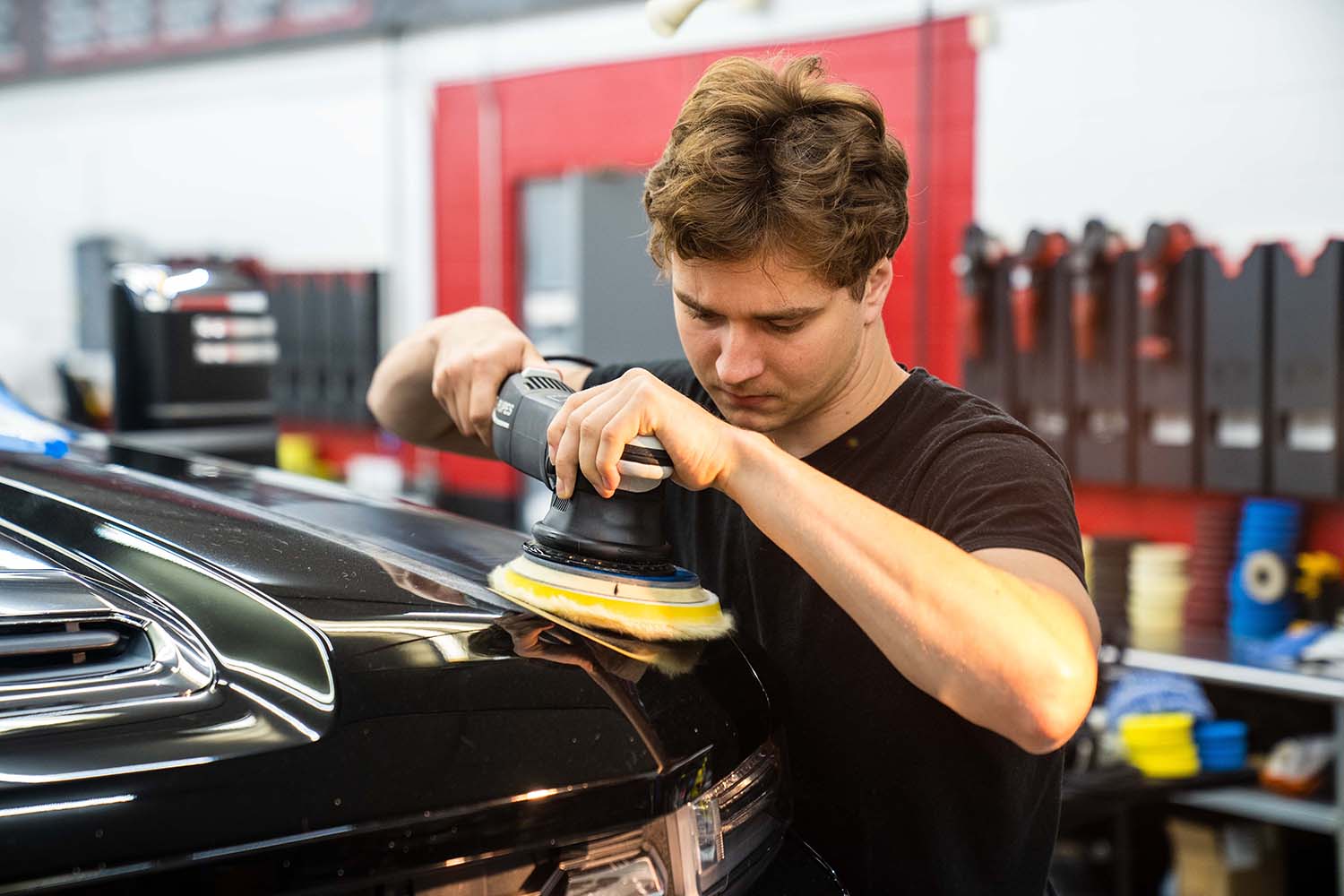 James Dawson machine polishing paint correction on a luxury car