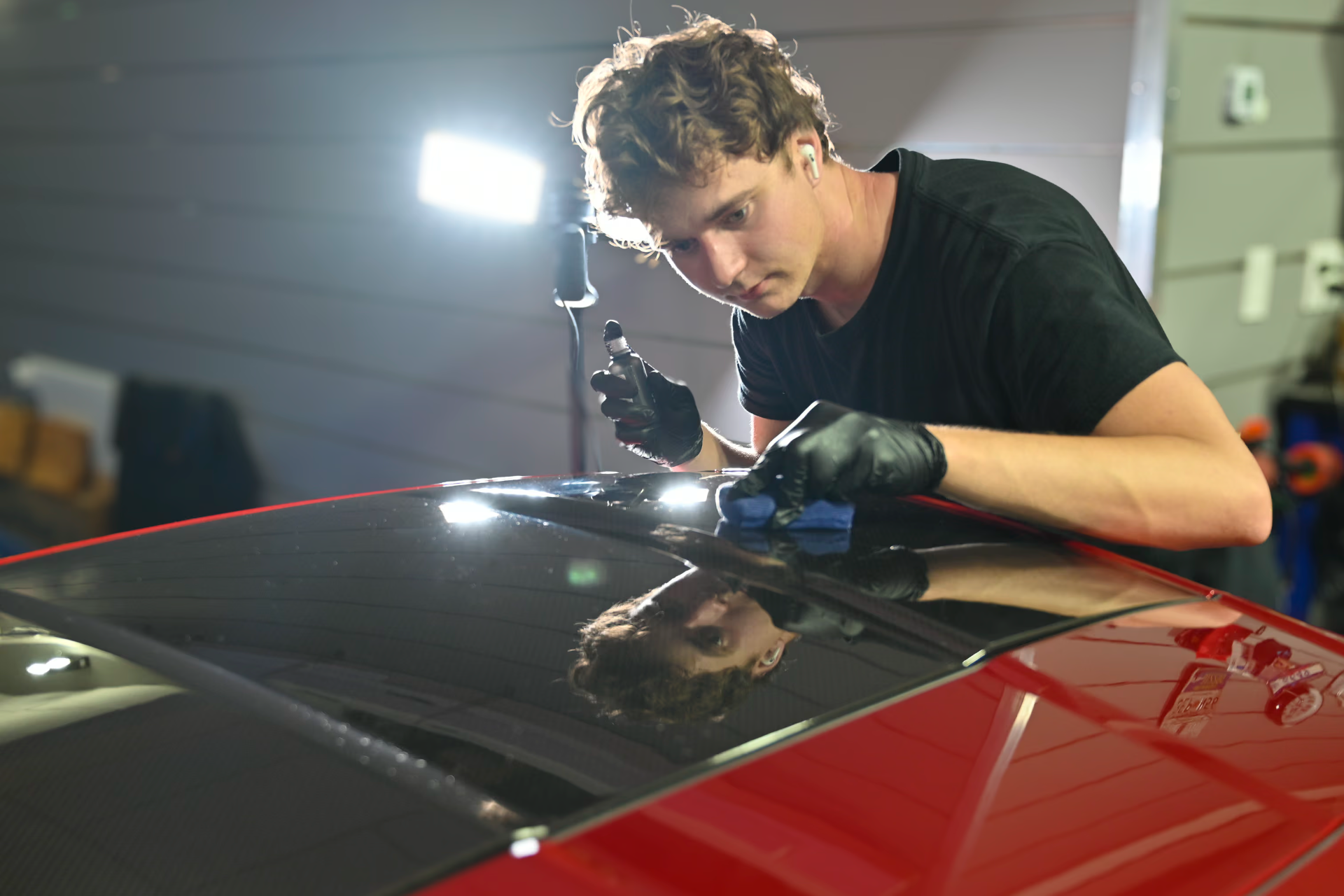 Corvette Z06 mid-polish during paint correction